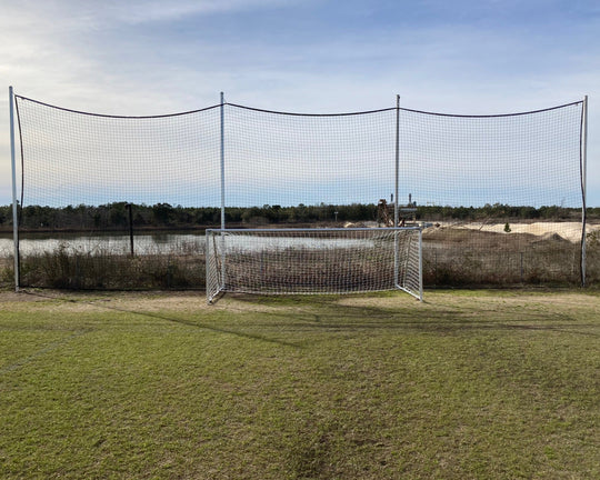 backstop net system with soccer goal